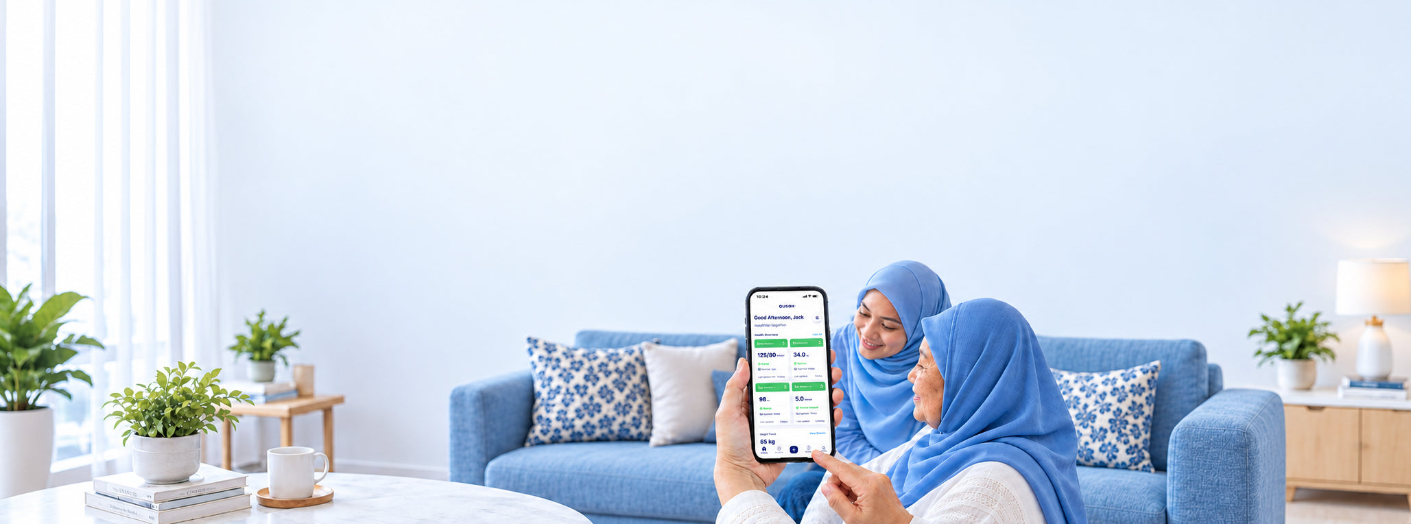 Illustrative Malaysian family viewing the OUSON Health App together in a bright home