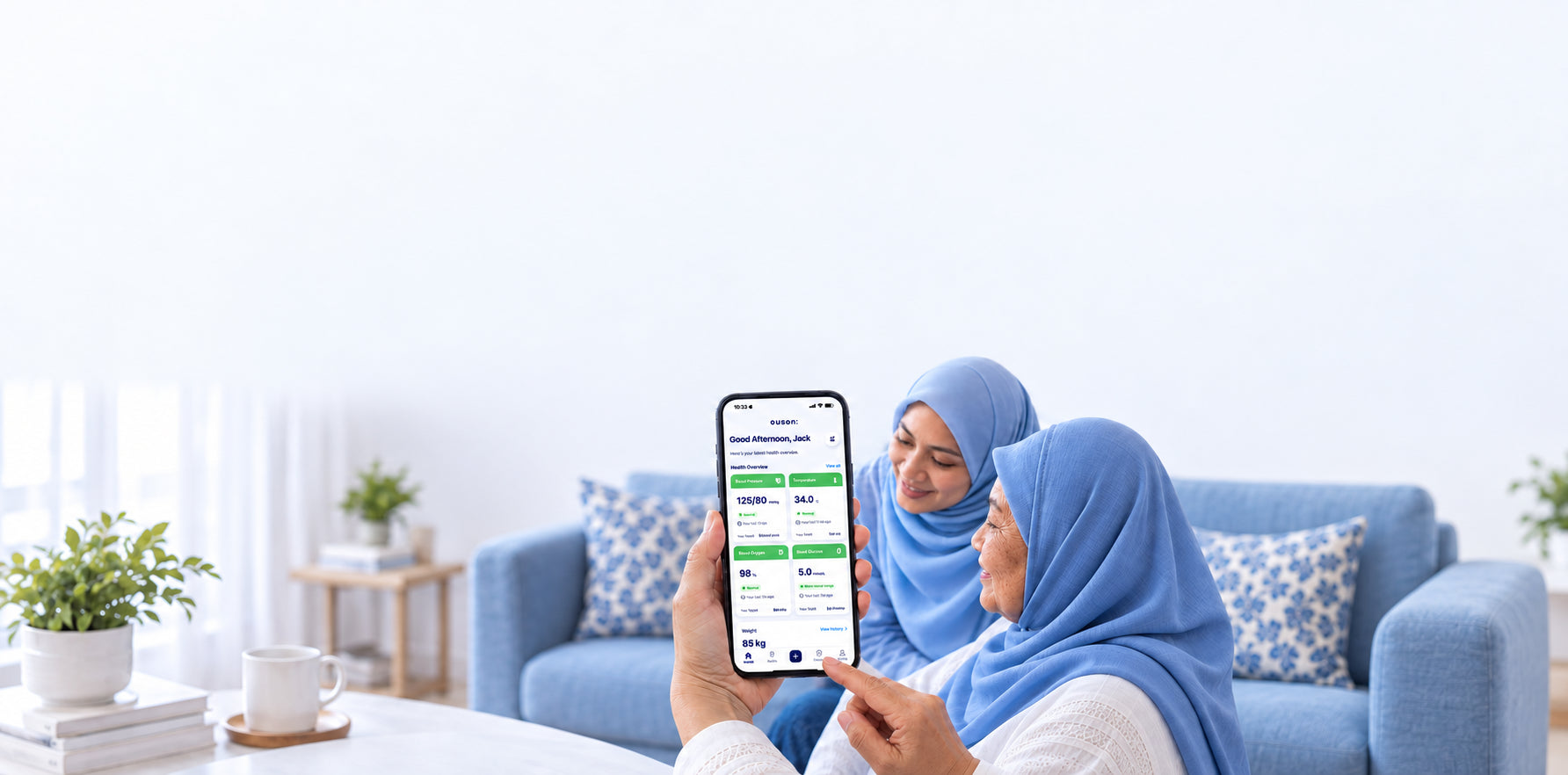 Illustrative Malaysian family viewing the OUSON Health App together in a bright home